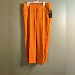 NWTs ! Women’s dress pants , mustard yellow, size medium.
